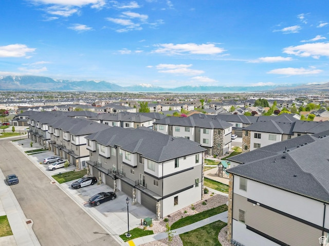 aerial view featuring a residential view and a mountain view