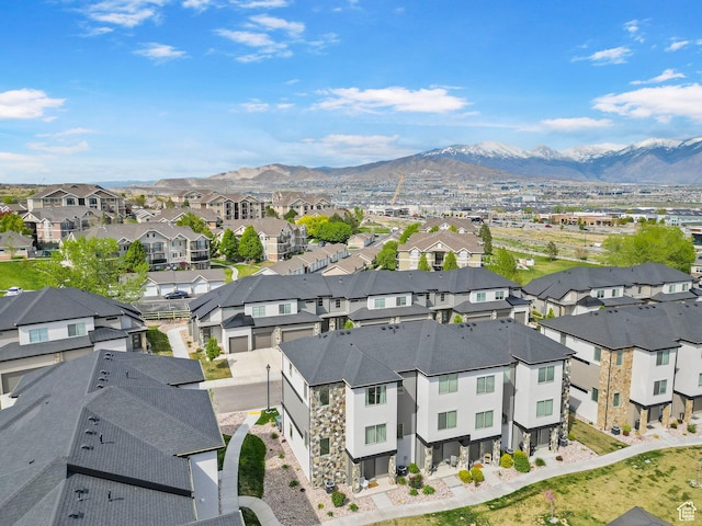 drone / aerial view with a residential view and a mountain view