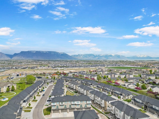 drone / aerial view with a residential view and a mountain view