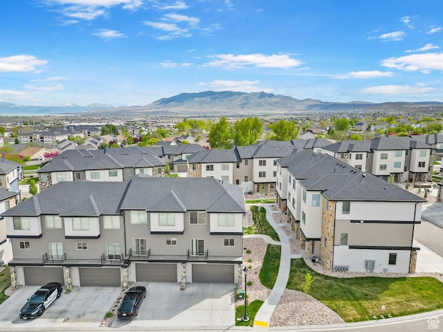 bird's eye view with a mountain view and a residential view
