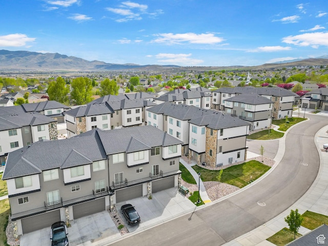 bird's eye view with a residential view and a mountain view