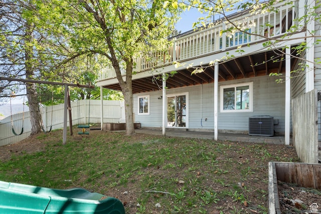 3102 S Applewood Dr E, Bountiful, UT 84010 - back of property featuring central AC, a deck, and fence
