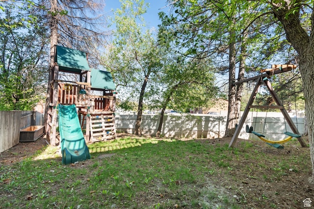 3102 S Applewood Dr E, Bountiful, UT 84010 - view of yard featuring a playground and a fenced backyard