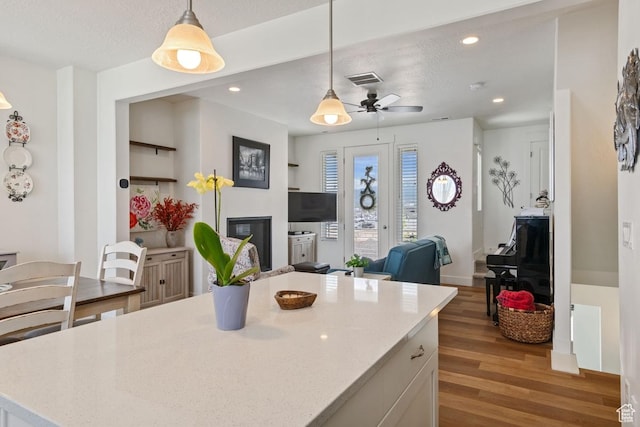 10983 S Lake Run Rd, South Jordan, UT 84009 - kitchen with light wood-style flooring, recessed lighting, a ceiling fan, decorative light fixtures, and open floor plan