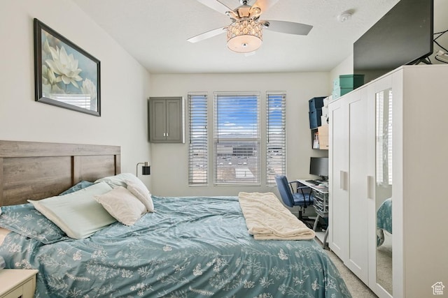 10983 S Lake Run Rd, South Jordan, UT 84009 - carpeted bedroom with a desk and a ceiling fan