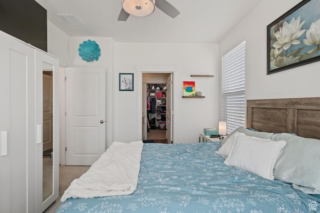 10983 S Lake Run Rd, South Jordan, UT 84009 - carpeted bedroom with a spacious closet, ceiling fan, and a closet