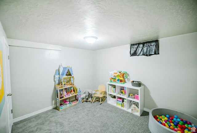 663 W 3500 S, Bountiful, UT 84010 - recreation room with baseboards, carpet flooring, and a textured ceiling