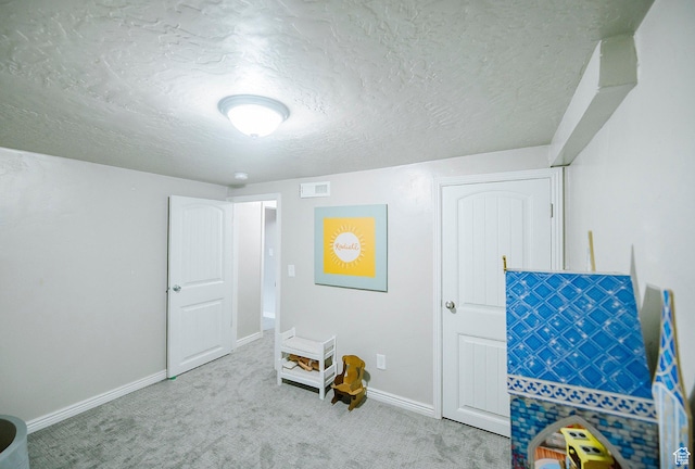 663 W 3500 S, Bountiful, UT 84010 - recreation room with visible vents, a textured ceiling, carpet, and baseboards