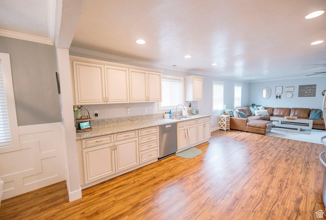 663 W 3500 S, Bountiful, UT 84010 - kitchen with crown molding, stainless steel dishwasher, a sink, open floor plan, and light wood-style flooring