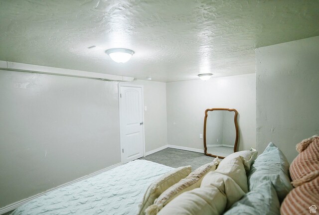 663 W 3500 S, Bountiful, UT 84010 - bedroom with carpet floors, a textured ceiling, and baseboards