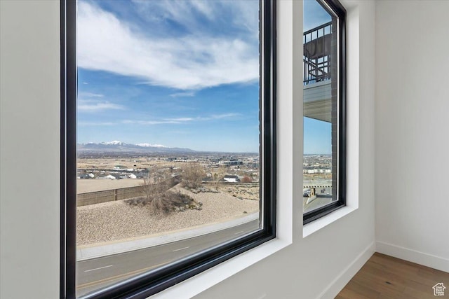 14374 S Champ Cv Unit 138, Draper, UT 84020 - interior details featuring baseboards, a mountain view, and wood finished floors