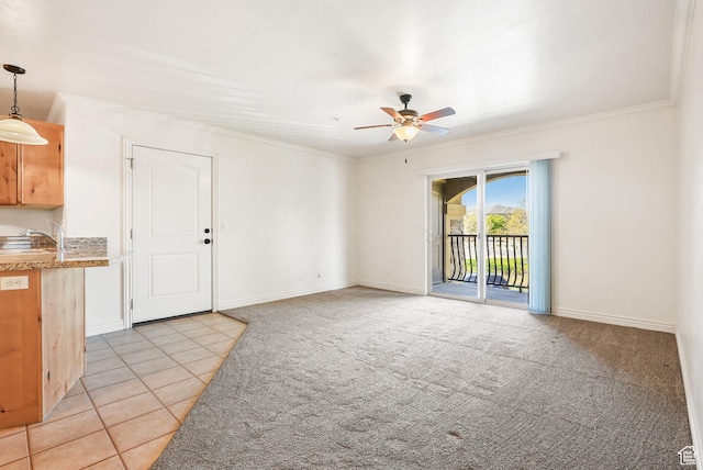 425 S 2220 W Unit 202, Pleasant Grove, UT 84062 - unfurnished living room featuring ornamental molding, light carpet, baseboards, ceiling fan, and light tile patterned floors