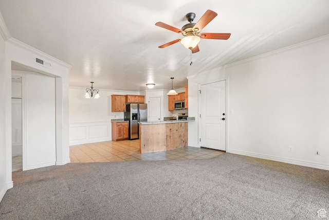 425 S 2220 W Unit 202, Pleasant Grove, UT 84062 - kitchen featuring light tile patterned flooring, light colored carpet, appliances with stainless steel finishes, ceiling fan with notable chandelier, and decorative light fixtures