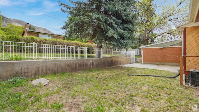940 S Taylor E, Ogden, UT 84404 - view of yard featuring central air condition unit and fence