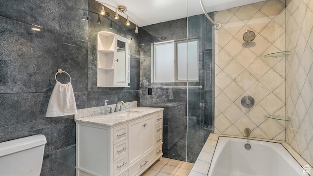 940 S Taylor E, Ogden, UT 84404 - bathroom with tile walls, tile patterned flooring, vanity, and toilet