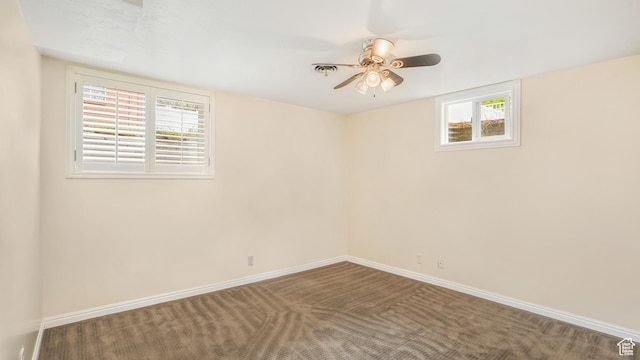 940 S Taylor E, Ogden, UT 84404 - carpeted empty room with baseboards, a ceiling fan, and a wealth of natural light