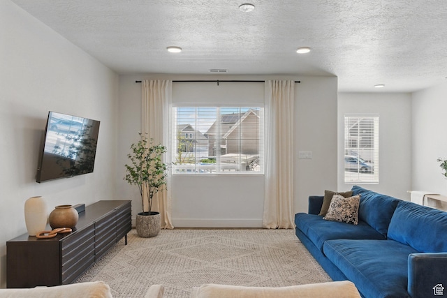 4236 N Magnolia Cir, Eagle Mountain, UT 84005 - living area with a textured ceiling and baseboards