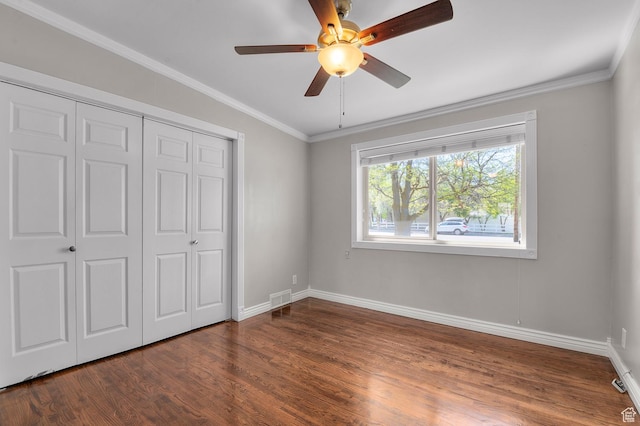 931 E 7800 S, Midvale, UT 84047 - unfurnished bedroom featuring baseboards, a closet, dark wood finished floors, and visible vents