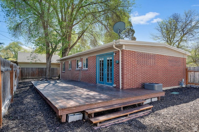 931 E 7800 S, Midvale, UT 84047 - wooden deck featuring cooling unit, french doors, and a fenced backyard