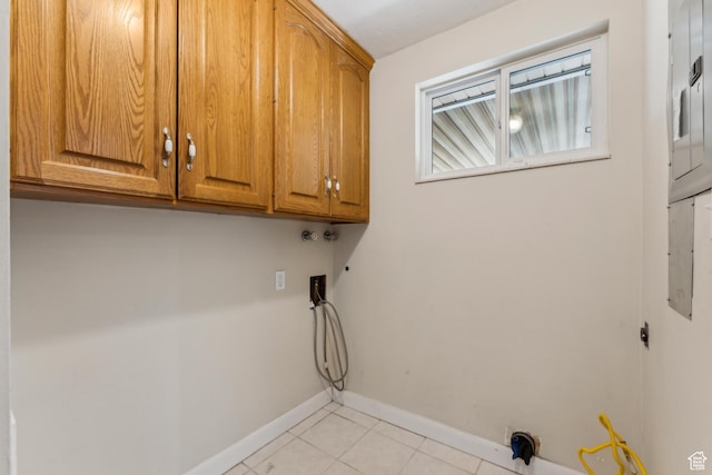 3475 S 3650 E, Millcreek, UT 84109 - laundry area featuring cabinet space, light tile patterned floors, baseboards, and washer hookup