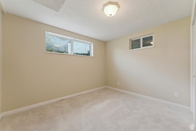 3475 S 3650 E, Millcreek, UT 84109 - unfurnished room featuring baseboards and light carpet