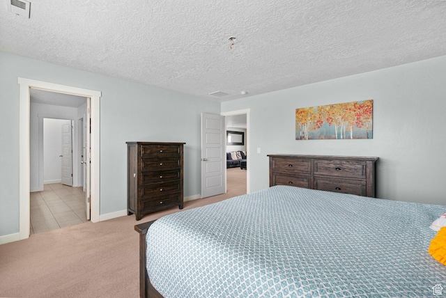 145 W 750 S, American Fork, UT 84003 - carpeted bedroom featuring baseboards, tile patterned flooring, a textured ceiling, and visible vents