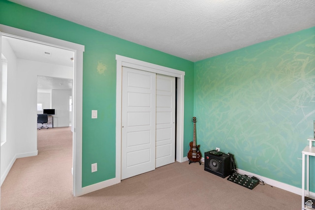 145 W 750 S, American Fork, UT 84003 - bedroom with a textured ceiling, baseboards, carpet, and a closet