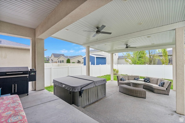 145 W 750 S, American Fork, UT 84003 - view of patio / terrace with a fenced backyard, a ceiling fan, an outdoor living space, and a hot tub
