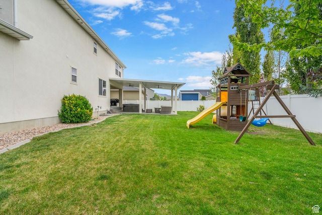 145 W 750 S, American Fork, UT 84003 - view of yard featuring a fenced backyard, a playground, and a patio area