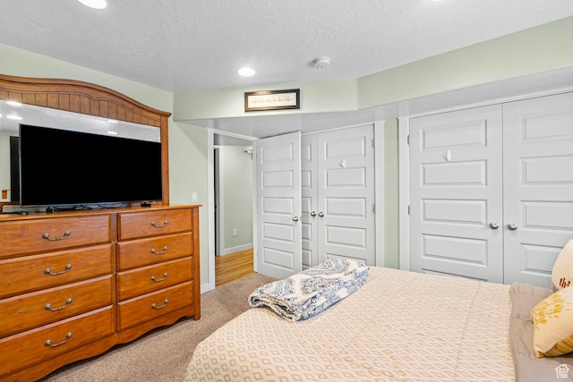 145 W 750 S, American Fork, UT 84003 - bedroom featuring recessed lighting, a textured ceiling, and light colored carpet