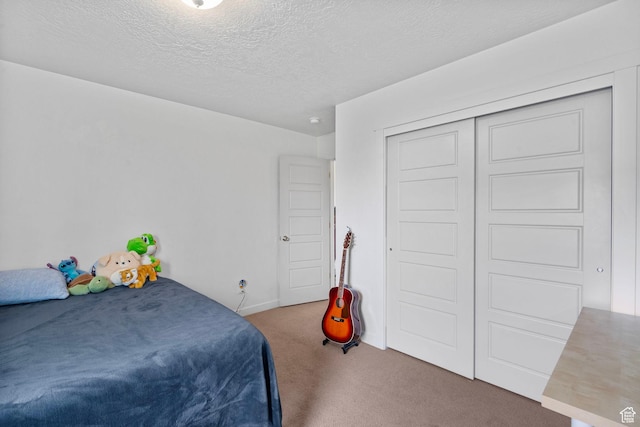 145 W 750 S, American Fork, UT 84003 - bedroom featuring carpet flooring, a textured ceiling, and a closet