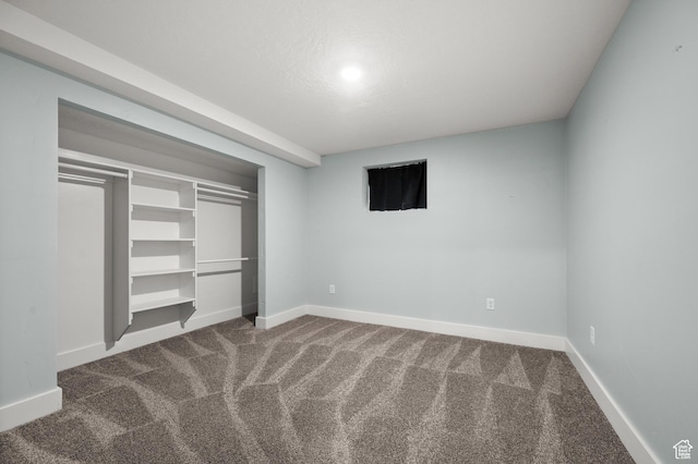 3581 E Yosemite Dr S, Millcreek, UT 84109 - unfurnished bedroom with carpet flooring, baseboards, and a closet