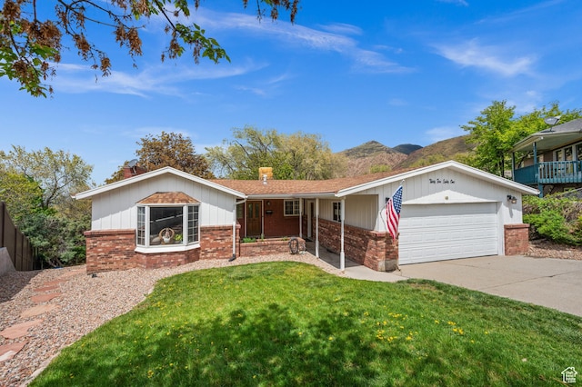 3581 E Yosemite Dr S, Millcreek, UT 84109 - ranch-style home with brick siding, a front lawn, a garage, driveway, and a chimney