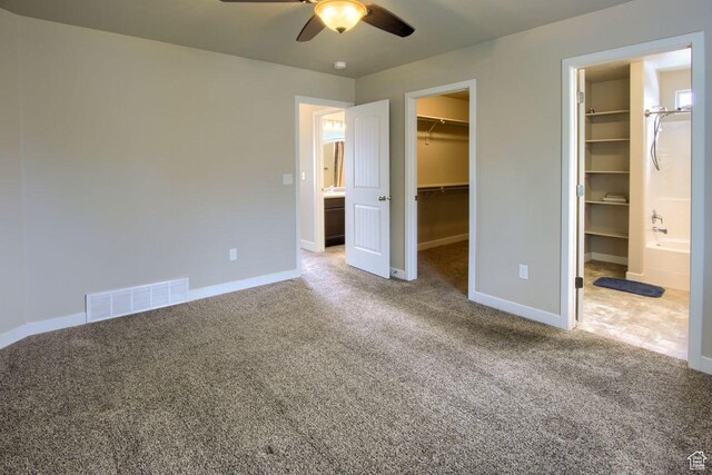 566 N 640 W, Tooele, UT 84074 - unfurnished bedroom with visible vents, baseboards, carpet floors, and a spacious closet