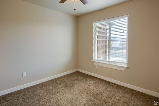566 N 640 W, Tooele, UT 84074 - spare room with carpet flooring, a ceiling fan, baseboards, and a healthy amount of sunlight