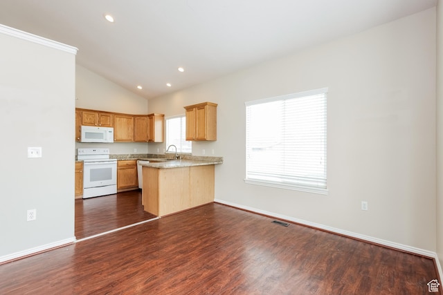 4018 W 5250 S, Roy, UT 84067 - kitchen featuring a peninsula, lofted ceiling, white appliances, a sink, and dark wood finished floors