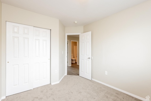 4018 W 5250 S, Roy, UT 84067 - unfurnished bedroom with a closet, baseboards, and carpet flooring