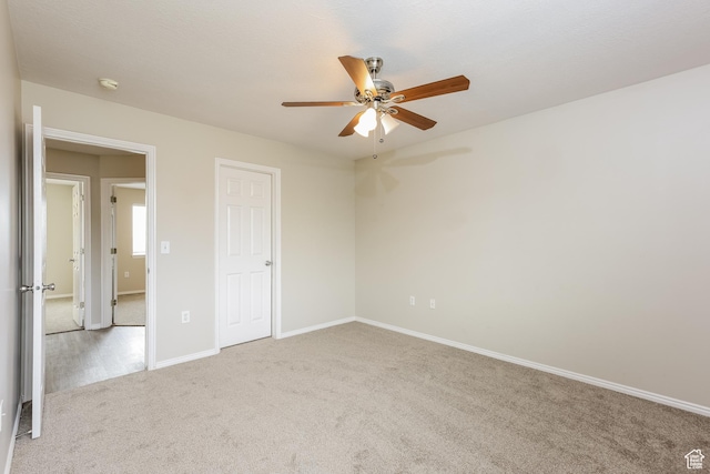 4018 W 5250 S, Roy, UT 84067 - unfurnished bedroom with carpet floors, baseboards, and ceiling fan