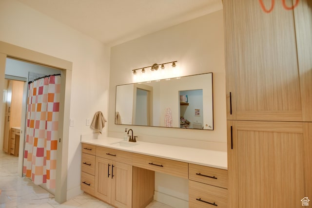 full bathroom with a shower with curtain, marble finish floor, and vanity