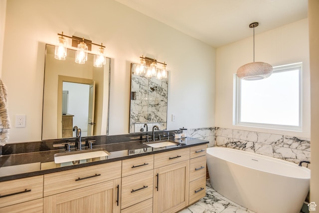 full bathroom featuring a sink, double vanity, and marble finish floor