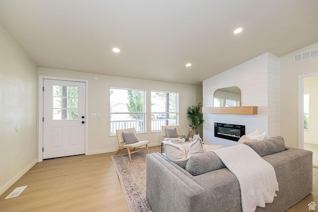 916 W 1150 S, Provo, UT 84601 - living area featuring light wood-style floors, a large fireplace, recessed lighting, and visible vents