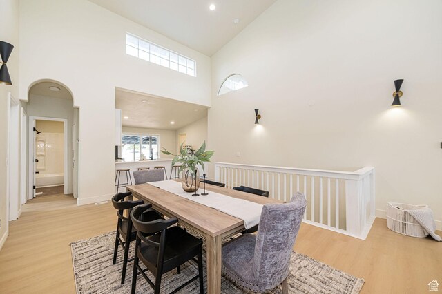 916 W 1150 S, Provo, UT 84601 - dining space featuring baseboards, recessed lighting, light wood finished floors, and a towering ceiling