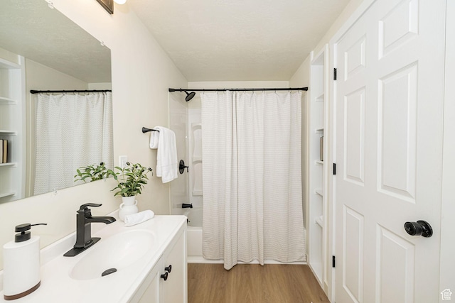 916 W 1150 S, Provo, UT 84601 - bathroom with vanity, shower / bathtub combination with curtain, and wood finished floors