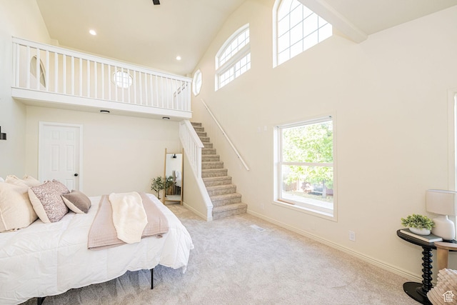 916 W 1150 S, Provo, UT 84601 - bedroom featuring carpet floors, high vaulted ceiling, visible vents, and multiple windows