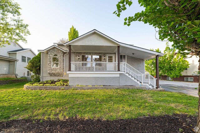 916 W 1150 S, Provo, UT 84601 - ranch-style house with stairs, stone siding, stucco siding, a porch, and a front yard