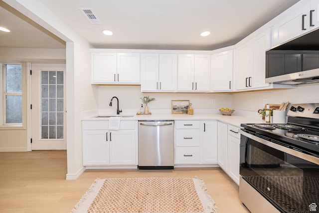916 W 1150 S, Provo, UT 84601 - kitchen featuring visible vents, appliances with stainless steel finishes, light wood-type flooring, a sink, and light countertops