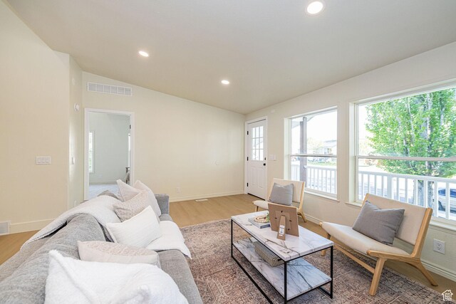 916 W 1150 S, Provo, UT 84601 - living room featuring visible vents, light wood-style flooring, and a wealth of natural light