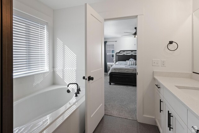 889 N 900 W, Tremonton, UT 84337 - ensuite bathroom with vanity, a ceiling fan, and plenty of natural light