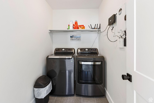 889 N 900 W, Tremonton, UT 84337 - clothes washing area featuring laundry area, baseboards, and separate washer and dryer