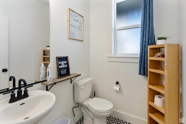 889 N 900 W, Tremonton, UT 84337 - half bathroom with a sink, baseboards, and toilet